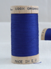 Wooden reel of organic cotton sewing thread in bright blue Ocean colour.