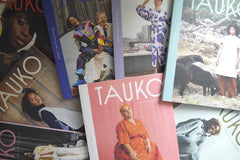Spread of TAUKO magazines on display