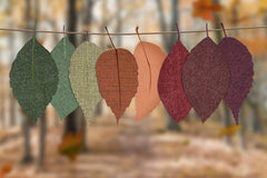 Sustainable fabric leaves hung on a rope