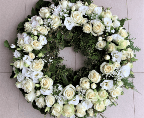 Funeral flower wreath with white flowers
