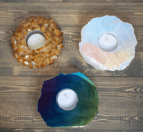 Citrine, opal aura quartz, and rainbow aura quartz candlestones and candle holders
