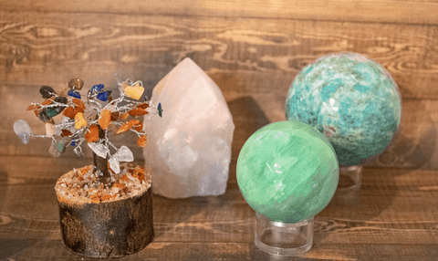 Mixed gemstone tree, rose quartz point, fluorite sphere, and amazonite sphere