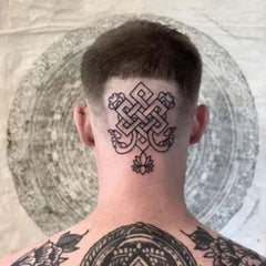 tatouage bouddhiste arrière de la tête