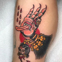 tatouage bouddhiste symbole main langue enfer