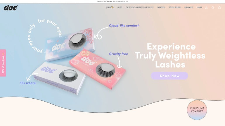 Screenshot of the Doe Lashes main homepage, displaying boxes of fake eyelashes against a baby blue background