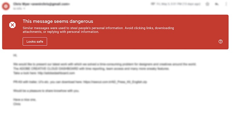 Microinteractions: An email screenshot with blurred text obscuring the email contents, with a large Gmail banner across the top, indicating that 'This message seems dangerous' because of the contents of the message.