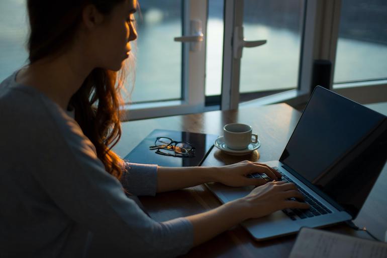 remote work: woman sitting at computer