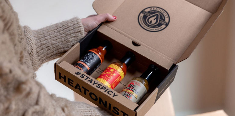 unboxing: open box with hot sauces displayed