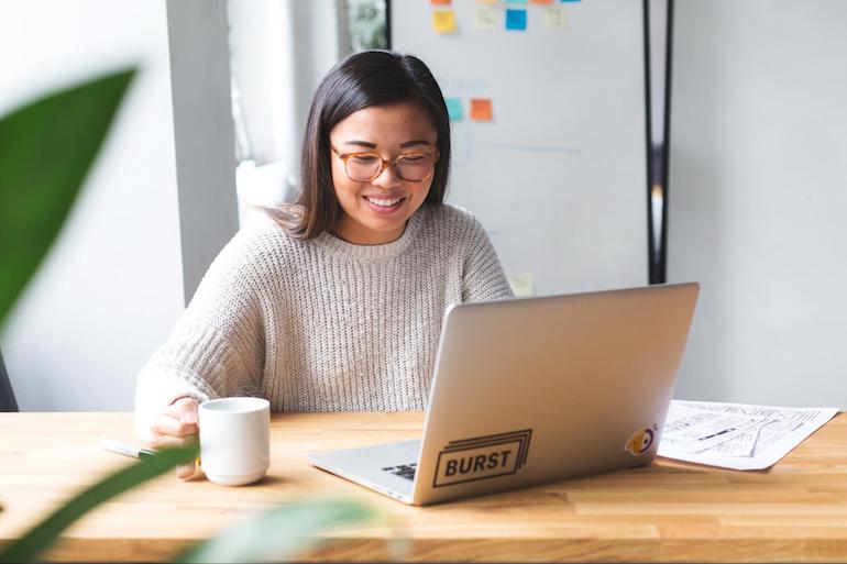 virtual events: woman sitting at desk front view