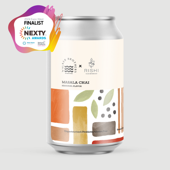 A can of Walker Brothers masala chai kombucha with a warmly colored abstract pattern on the label.