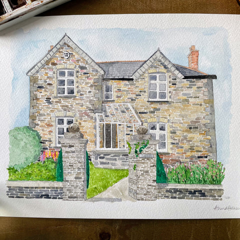 Completed watercolour house painting commission of a stone Cornish double fronted home.