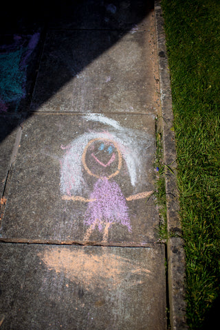 Sidewalk chalk art by a child