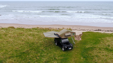 Land Rover defender with roof tent