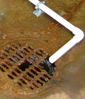 Drain damage due to condensate from a tankless water heater