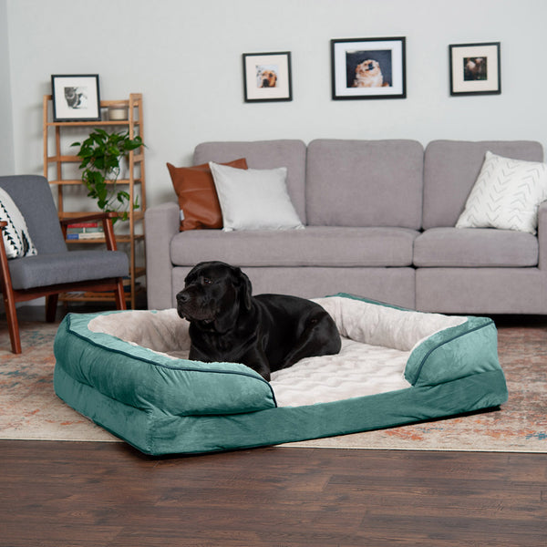 A dog lying in a FurHaven Velvet Waves Perfect Comfort bed.