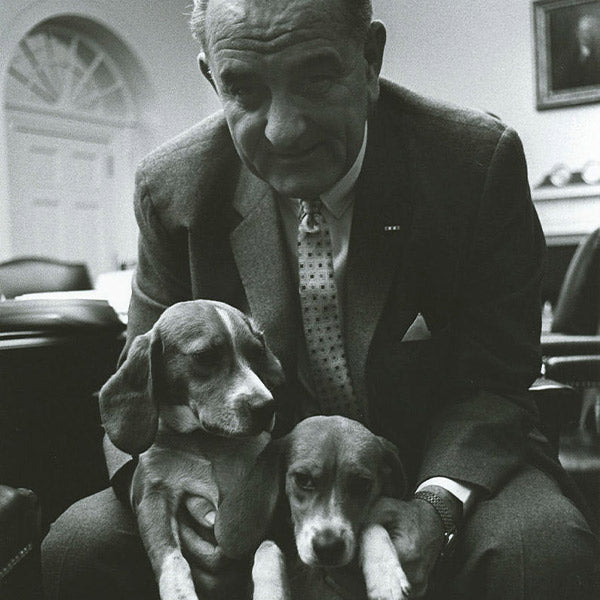 Lyndon B. Johnson posing with his two beagles, Him and Her, from FurHaven Pet Products