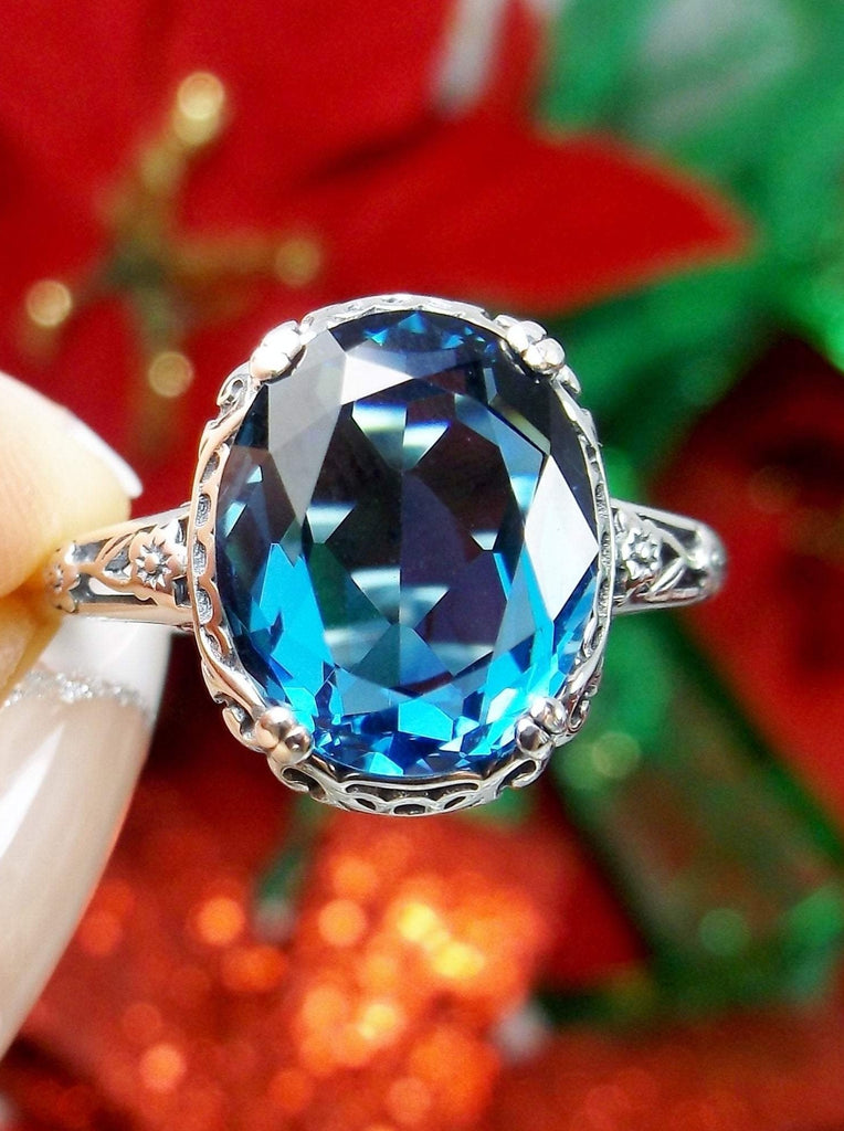Yellow Gold Blue Topaz Three-Stone Ring - 14k Oval 3.60ctw East-West Set -  Wilson Brothers Jewelry
