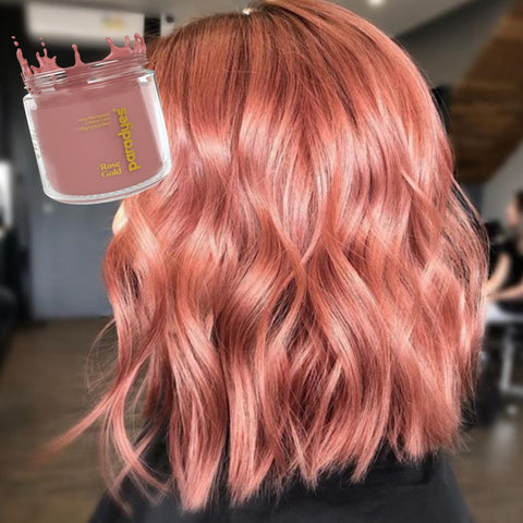 a girl with beachy waves and rose gold hair color from birds of paradyes.