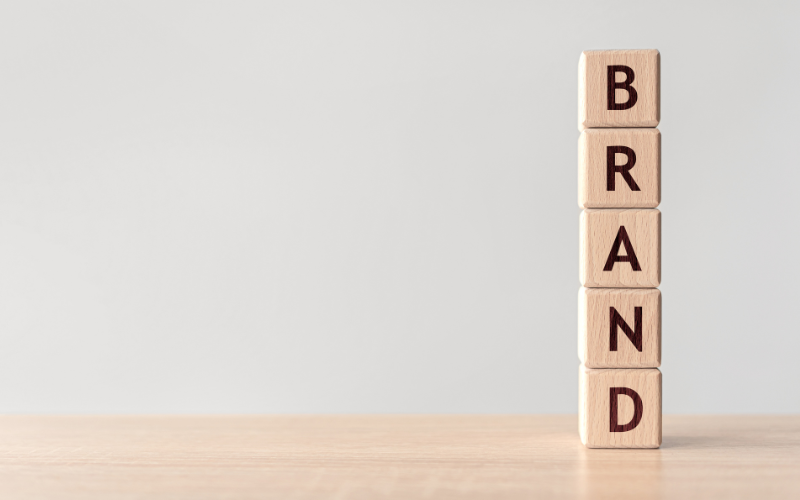 brand word is written on wooden blocks.