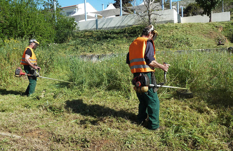 men wearing whipper snipper PPE