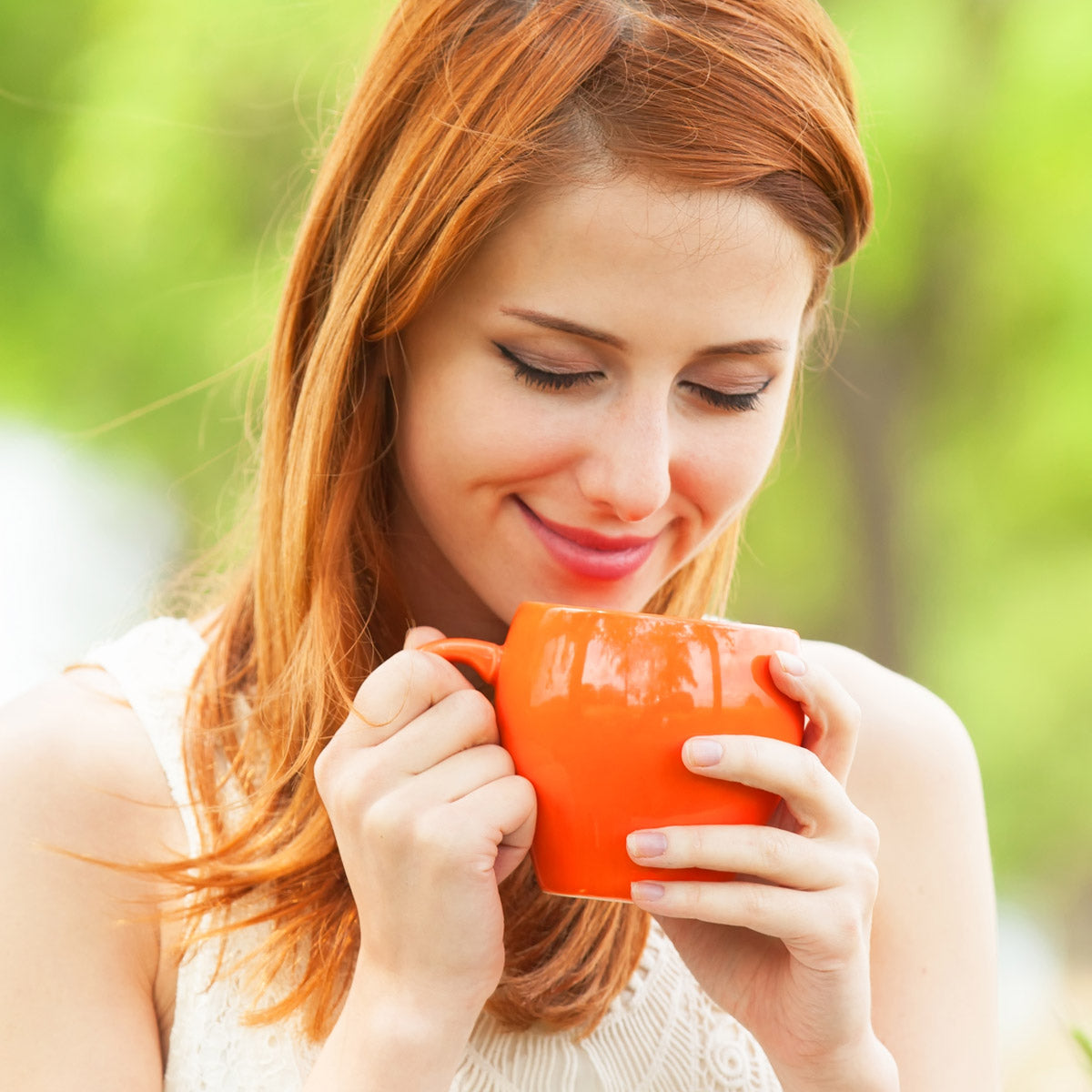 Woman enjoying Earl Grey tea