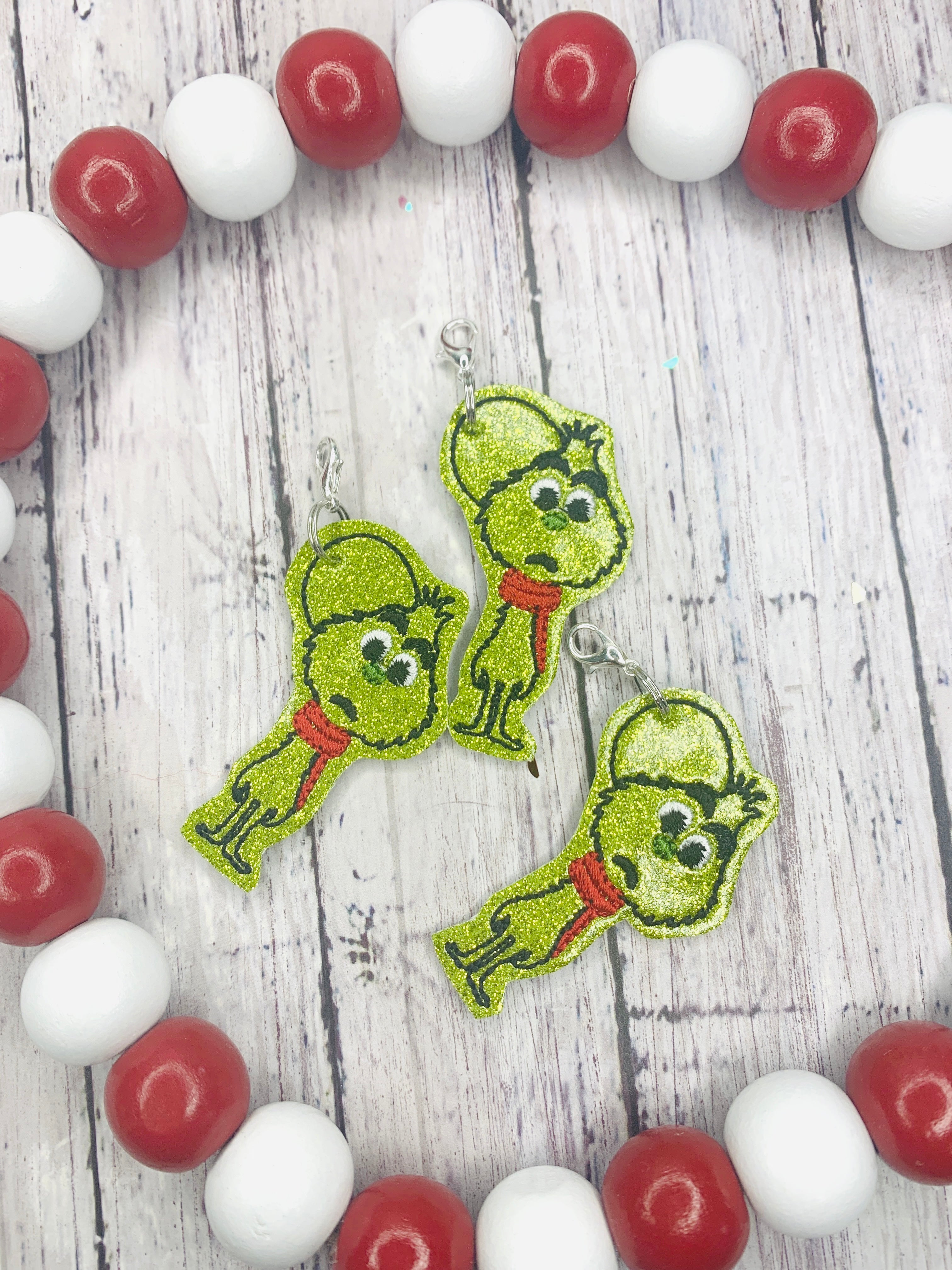Grumpy Baby Badge Reel Charm