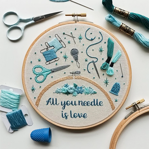 All you needle is love embroidery diy kit with hoop, embroidery threads, scissors, thimble.