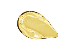  Texture shot of hyaluronic acid in the form of golden gel.