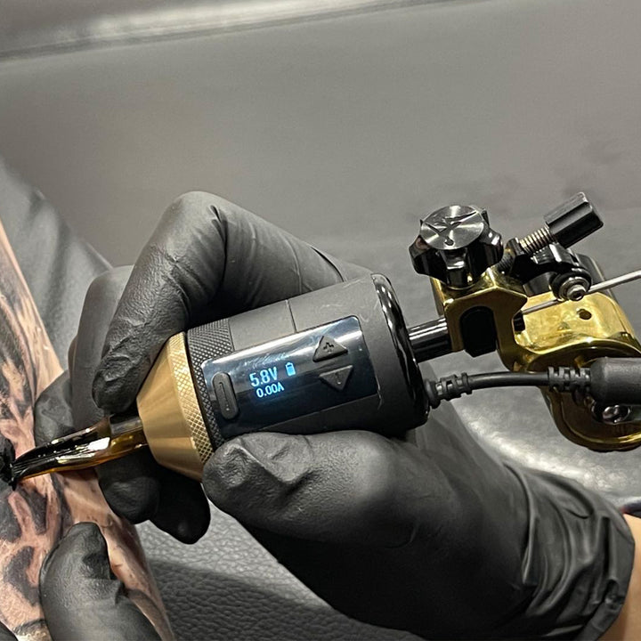 https://cdn.shopify.com/s/files/1/0534/0663/0038/files/Inkclaw_TK_M4SS_Shrapnel_Motor_Rotary_Tattoo_Machine_gold-4_720x.jpg?v=1615031488