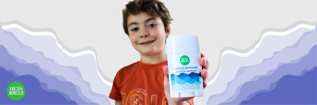 Boy Holding Fresh Monster Natural Deodorant for Kids