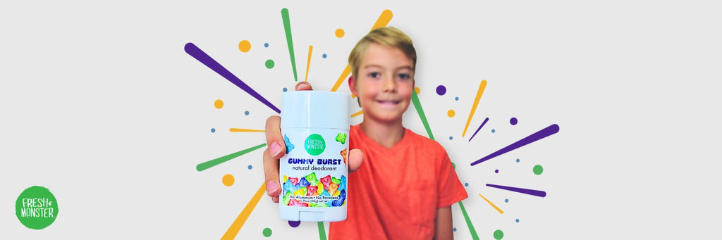 Kid Holding Fresh Monster Natural Deodorant for Kids