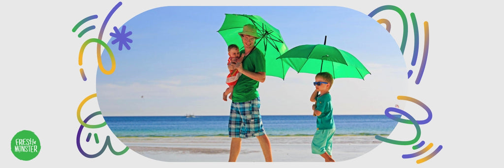 Parent and Kids on the Beach with Umbrellas