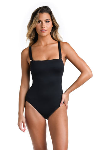 lady in a black one piece swimsuit