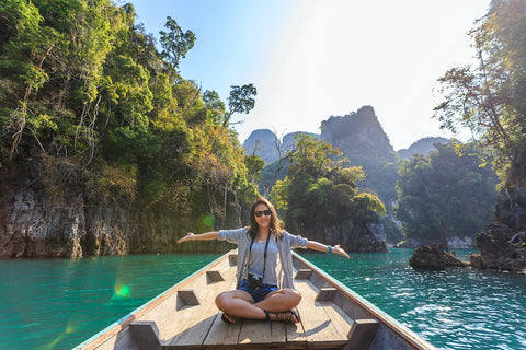 woman in the jungle on a boat
