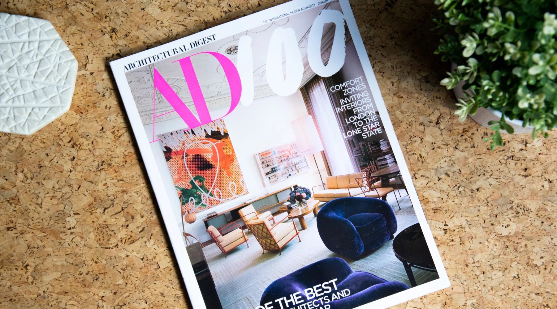 Architectural digest magazine on a wood table