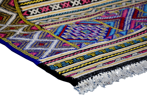 Corner photo of a handmade Kilim Taznakht rug