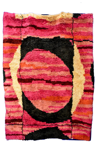 Standing photo of a handmade Beni Mrirt rug