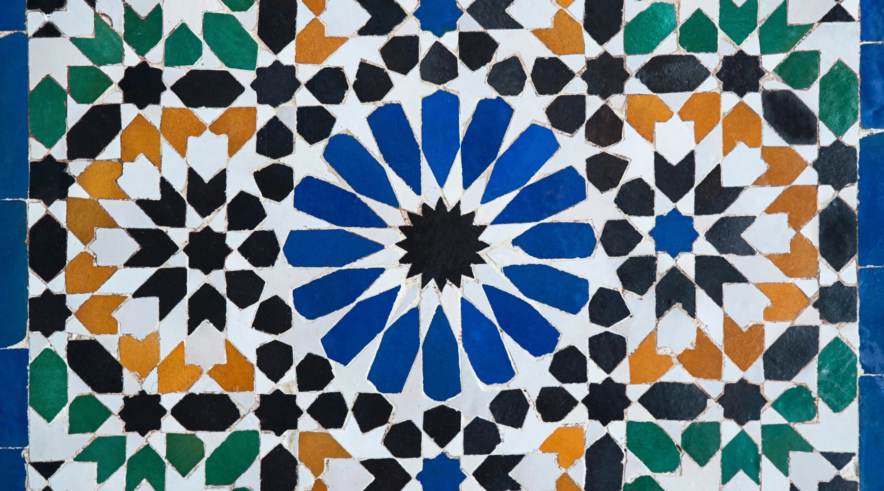 colored intricate geometric pattern of handmade moroccan zellige