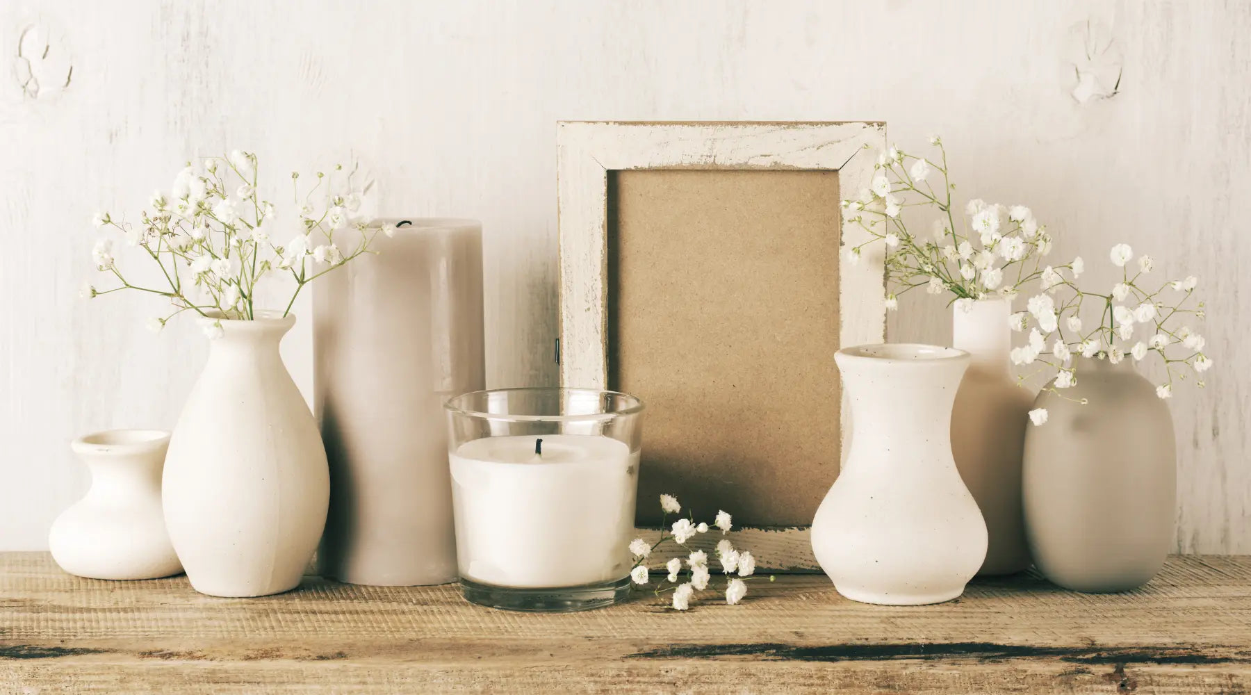 home-decoration-neutral-colored-flowers-pots-and-candles