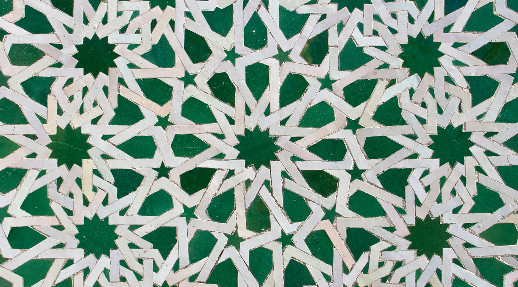 green geometric pattern of handmade moroccan zellige