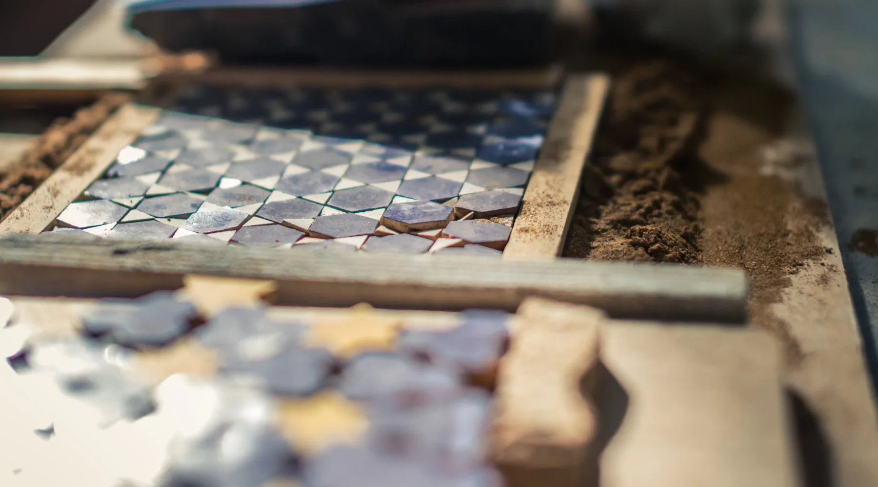 installation and assembly on frame of traditional moroccan blue zellig