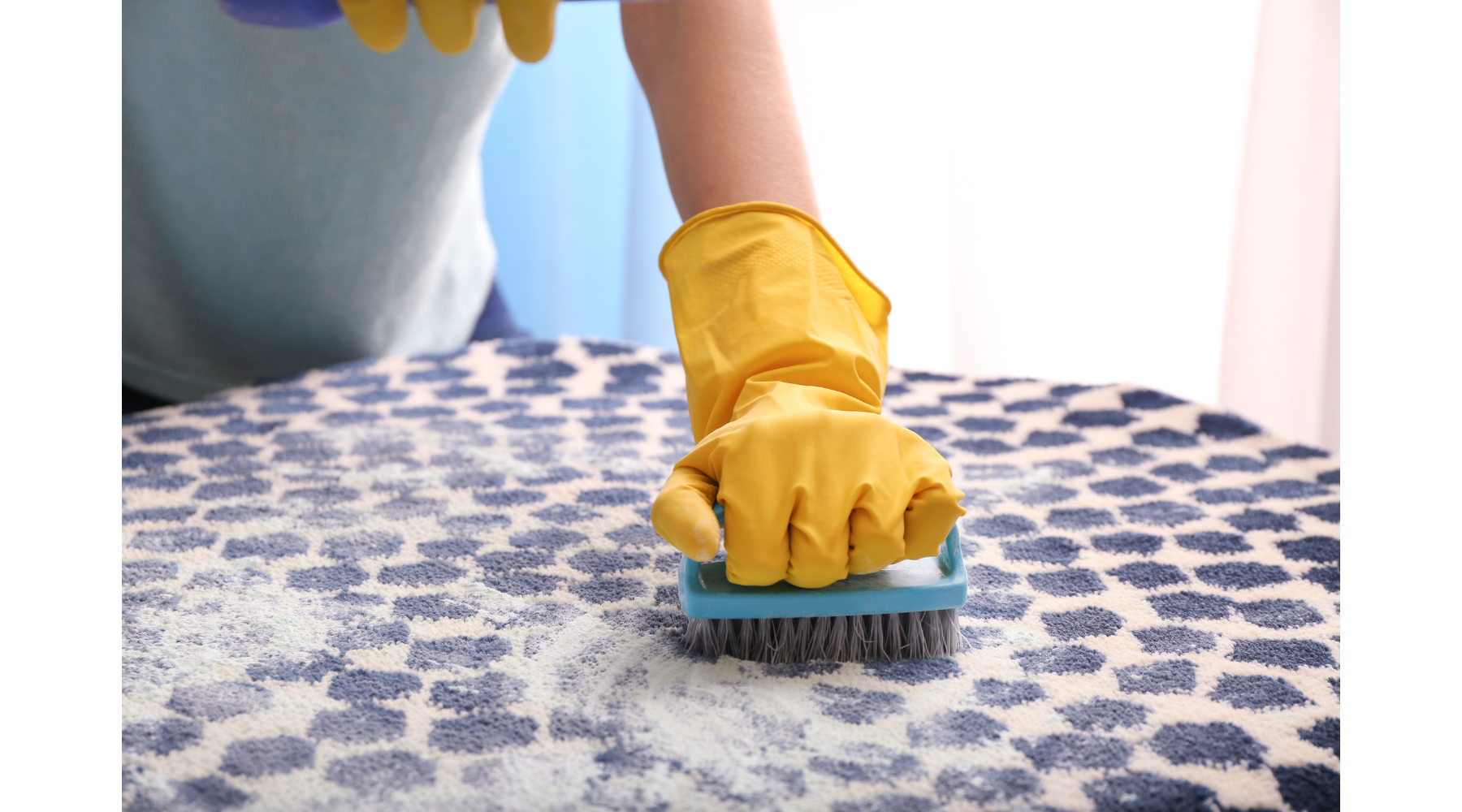 woman cleaning carpet with homemade carpet cleaning solution