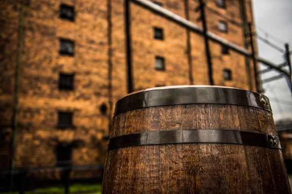 barrel of bourbon outside of building