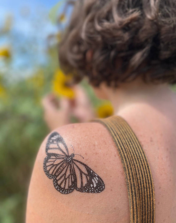 Tattoo of Musical notes Butterflies Music
