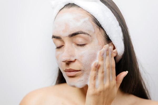 moisturising face with cleanser