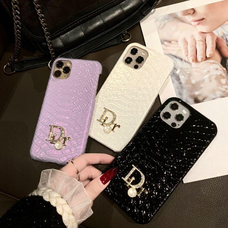 Fashionable iPhone Accessory with Dior's Iconic Serpent Design