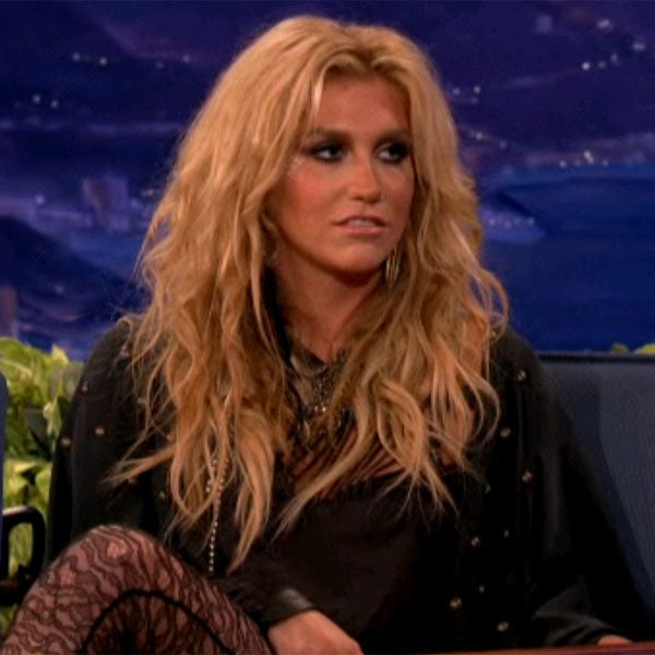 Kesha wearing brass okra earrings by Jenny Dayco 