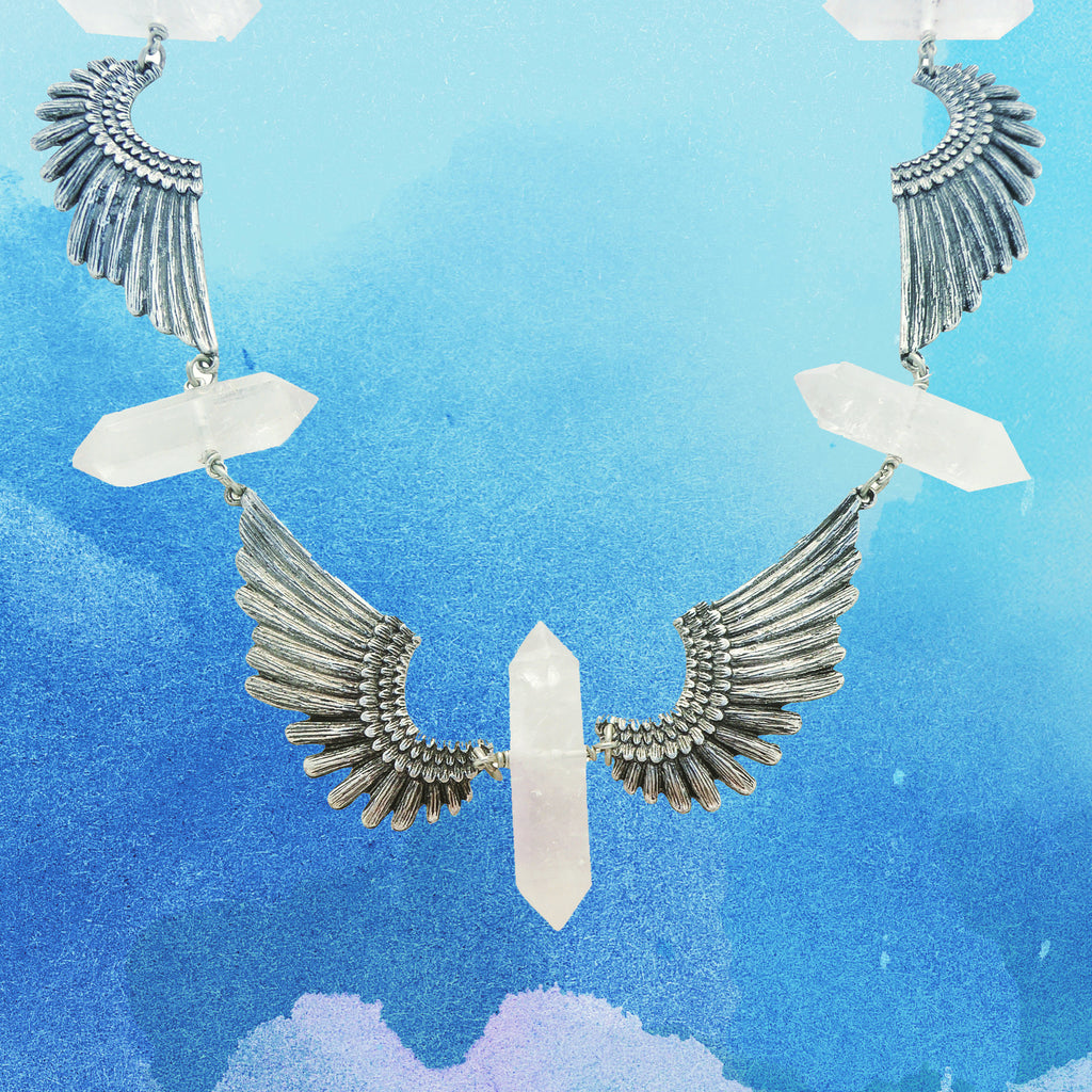 Quartz point and antique silver wing parendi necklace by Jenny Dayco