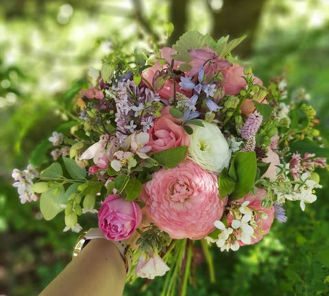 Bouquet of pink ranunculus and roses cut flowers flowers from the farm