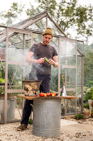 Gill Meller cooking with freshly picked courgettes and tomatoes from his Rhino Greenhouse